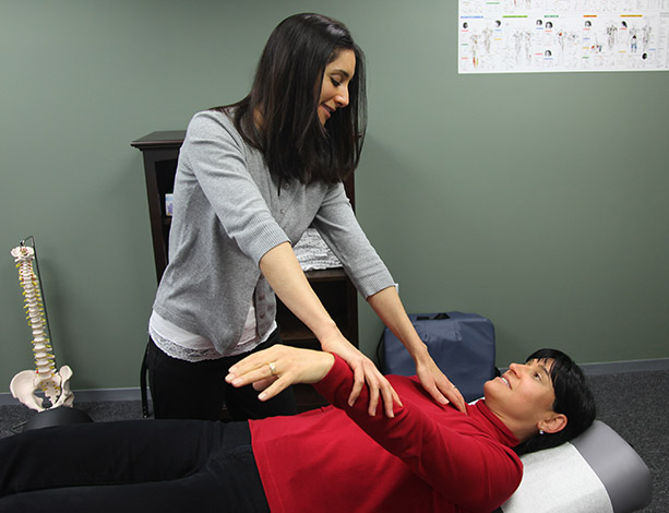 Dr. Firestone muscle testing a patient